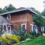 Detail view of Kitchen porch at grade change at West elevation.