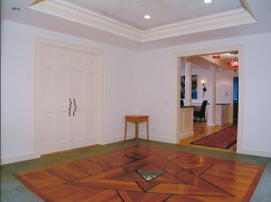 Custom Designed Floor in Vestibule in two mahogany woods.